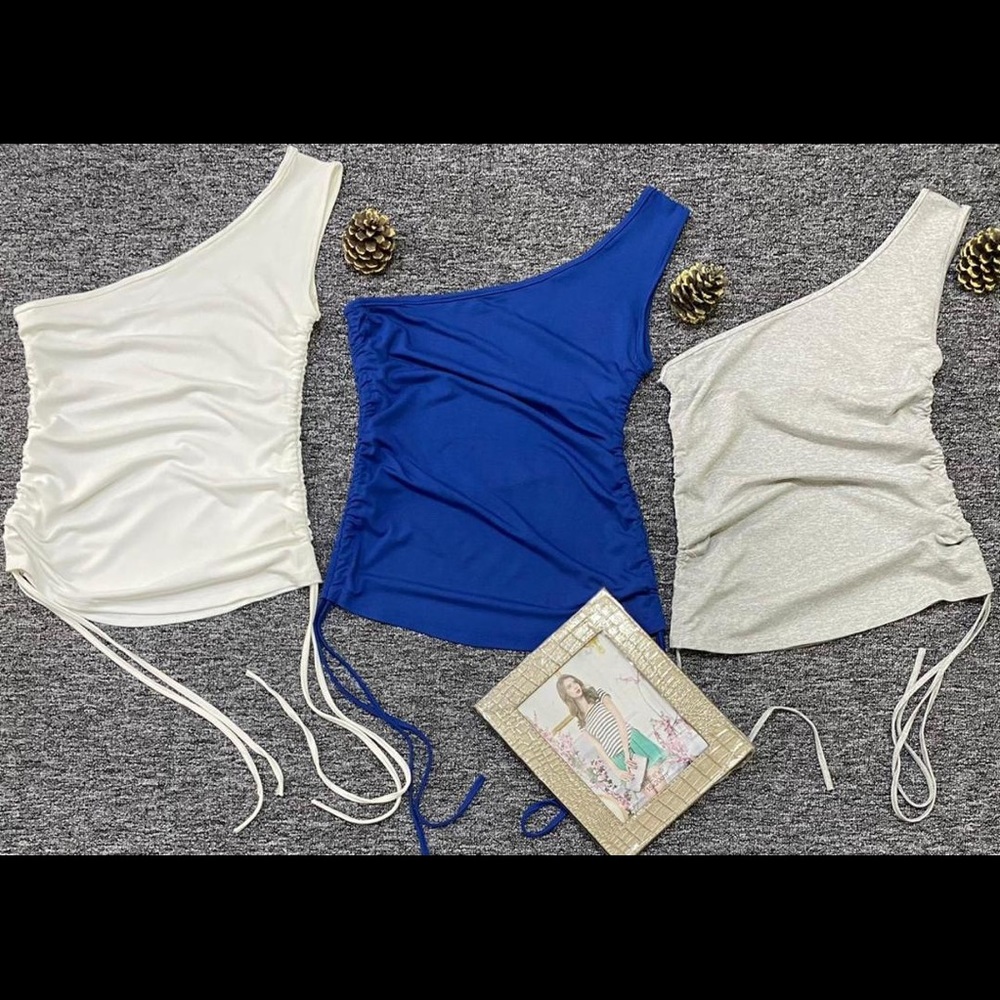 One shoulder blue top